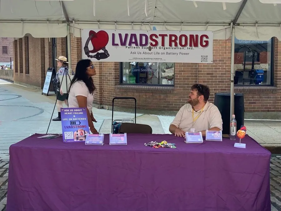 volunteers at lvadstrong booth at event