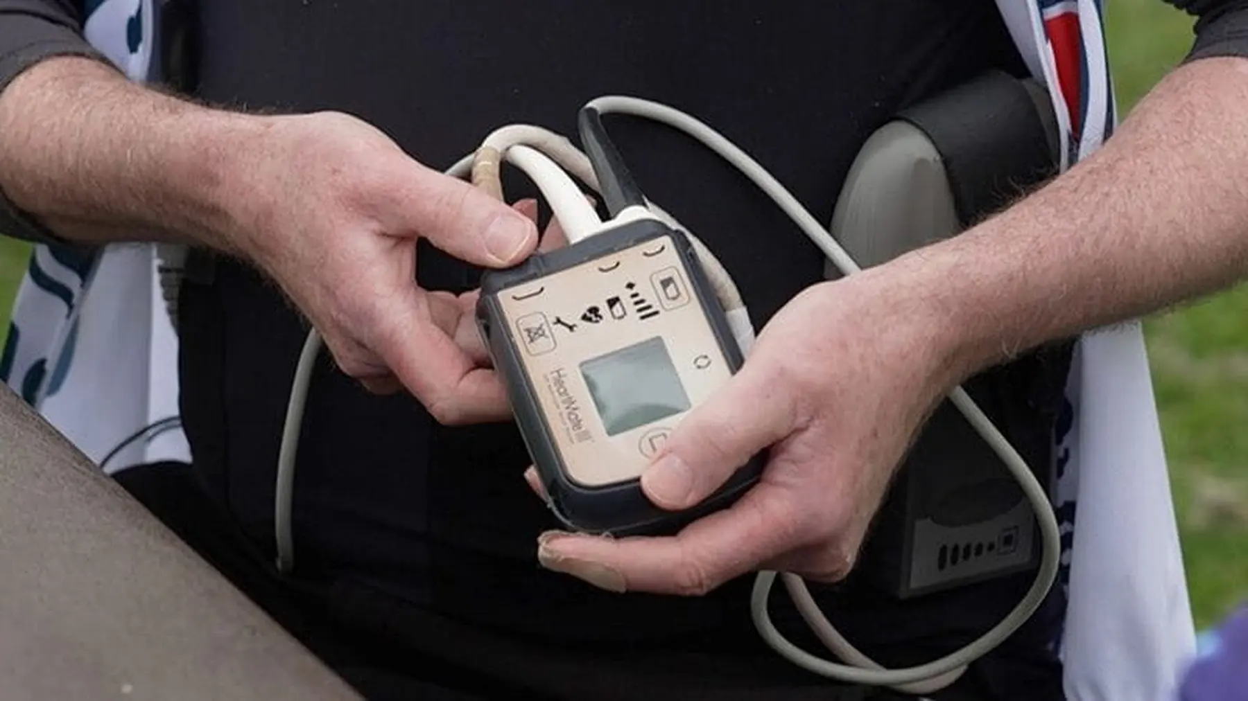 man holding lvad controller