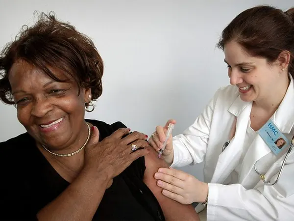doctor helping a patient