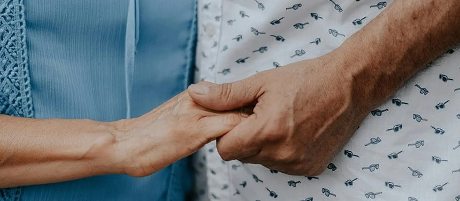 two people holding hands
